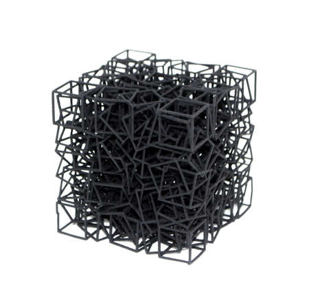 Model printed on 3D printer isolated on white background. Object detail printed on 3D printer from black plastic close-up. Prototype of shape made by 3d printer. Concept new modern printing technologyの写真素材