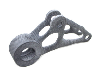 Gray model printed on 3D printer from polyamide plastic powder isolated on white background close-up. Object printed 3D printer. 3D printed prototype. New modern printing technology. Multi Jet Fusionの写真素材