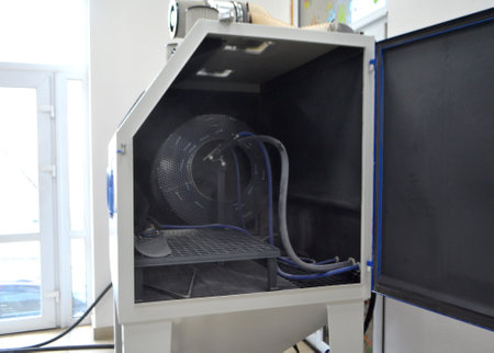Inside Shot blasting machine. Open machine for Shot blasting of objects. Industrial machineの写真素材