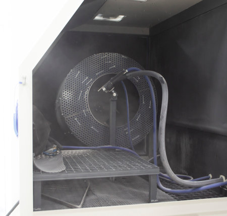 Inside Shot blasting machine. Open machine for Shot blasting of objects. Industrial machineの写真素材