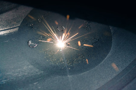 Laser sintering machine for metal. Metal is sintered under the action of laser into desired shape in working chamber. 3D printer printing metal. Modern additive technologies 4.0 industrial revolutionの写真素材