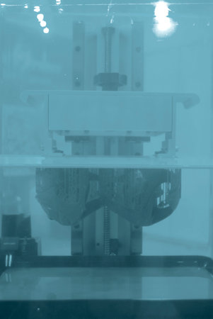 Process SLA 3D printing. Process printing on 3D printer by SLA printing technology. 3D printed...