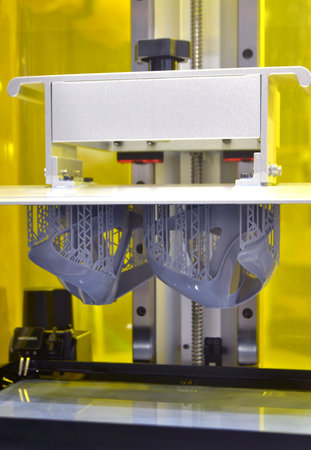 Process SLA 3D printing. Process printing on 3D printer by SLA printing technology. 3D printed...