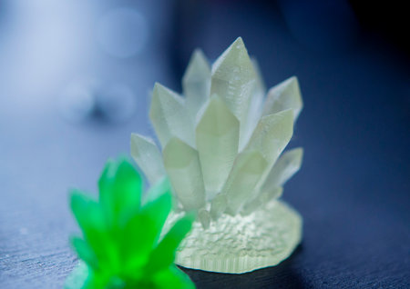 Detailed models in the form of crystals printed on 3D printer from polymer close-up. Detailed object...