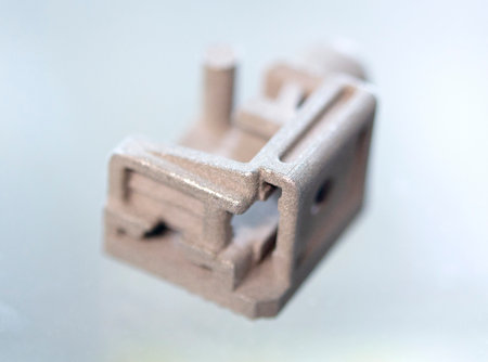 Object printed on 3D printer from metal powder using Metal Jet technology. High detailed detailing...