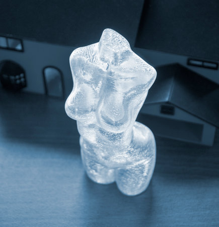 Model printed on 3D printer. Art object female body printed on a 3D printer from transparent plastic. Concept FDM 3D Printing. Additive modern new progressive technologyの写真素材