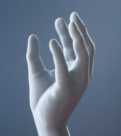 Art objects human hand printed on 3D printer. Interior model created on 3D printer from molten plastic. 3D printing technology. Additive modern new progressive technologies. FDM technologyの写真素材