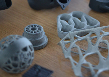 Plastic model printed on 3D printer from powder close-up. Objects created on 3D printer from...