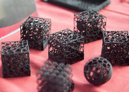 Plastic model printed on 3D printer from powder close-up. Objects created on 3D printer from...
