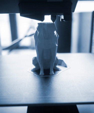 Process of printing on 3D printer. 3D printer printing object from molten plastic close-up. Creative...