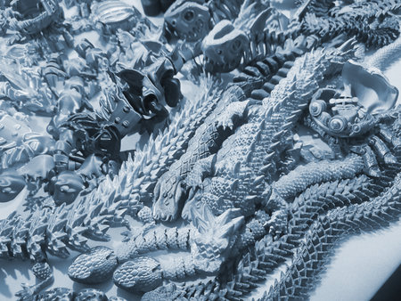 Art objects printed on a 3D printer. Various creative models created on a 3D printer from molten plastic. Concept 3D Printing. New modern 3D Printing additive technology. Blue colorの写真素材