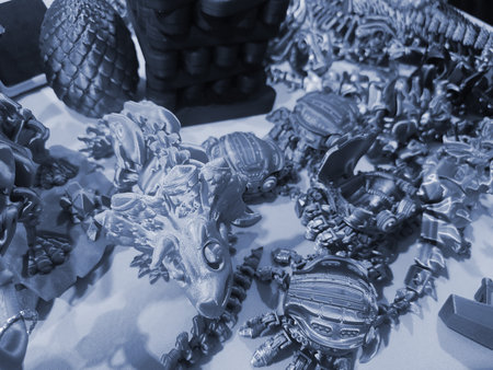 Art objects printed on a 3D printer. Various creative models created on a 3D printer from molten plastic. Concept 3D Printing. New modern 3D Printing additive technology. Blue colorの写真素材