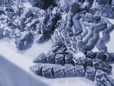 Art objects printed on a 3D printer. Various creative models created on a 3D printer from molten plastic. Concept 3D Printing. New modern 3D Printing additive technology. Blue colorの写真素材