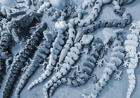 Art objects printed on a 3D printer. Various creative models created on a 3D printer from molten plastic. Concept 3D Printing. New modern 3D Printing additive technology. Blue colorの写真素材