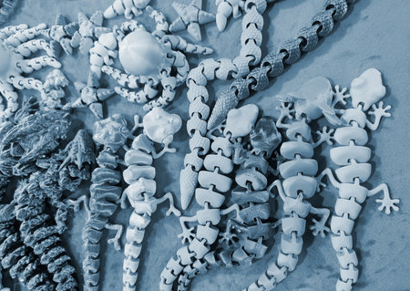 Art objects printed on 3D printer. Various creative models created on 3D printer from molten plastic. Concept 3D Printing technology. New modern 3D Printing additive technology. Blue colorの写真素材