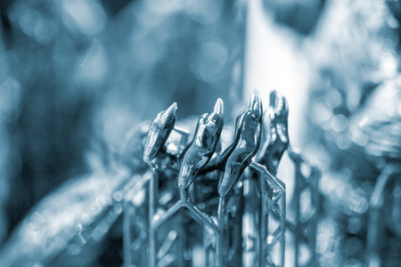 An object printed on a 3D printer from hardened rubber close-up. Model black color created on a 3D printer from hardened rubber under influence of ultraviolet light. SLA 3D printing. Stereolithographyの写真素材