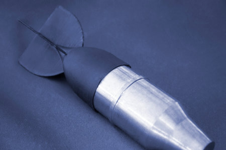Bomb model for drone. Model of bomb printed on 3D printer from melted plastic. Body of bomb with...