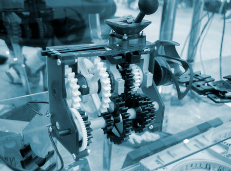 Construction mechanism of parts plastic gears printed on 3D printer. Model created on 3D printer...