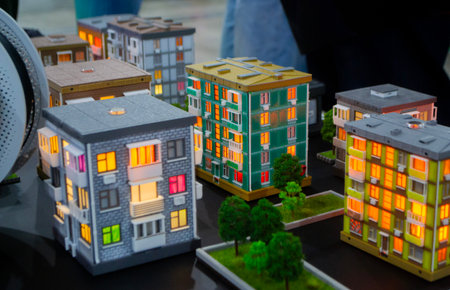 Prototype building printed on 3D printer from melted plastic. 3D-printed building prototype. A house...