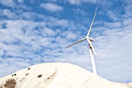 wind turbines on background of sky and cloudsの写真素材