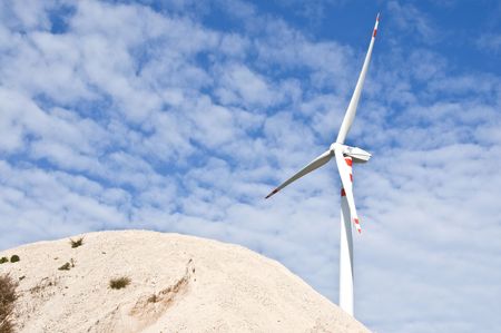 wind turbines on background of sky and cloudsの写真素材