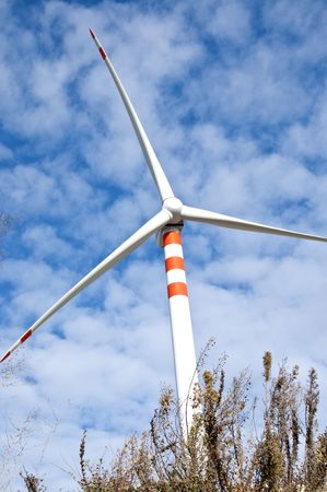 wind turbines on background of sky and cloudsの写真素材