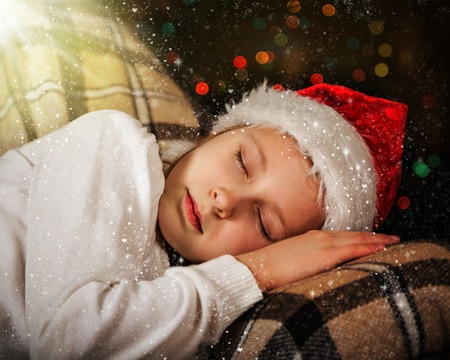 The child sleeps in christmas, christmas magic nightの写真素材