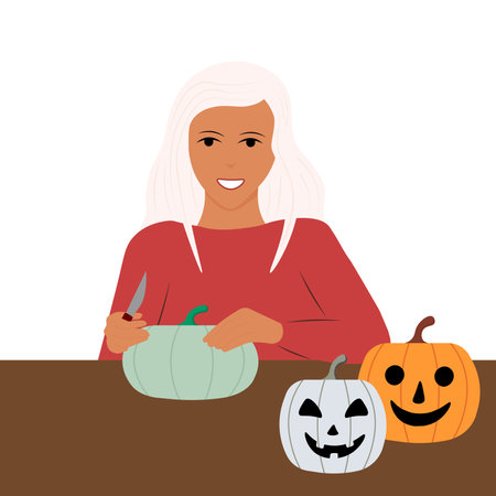The girl carves a lantern from a pumpkin. Preparing for Halloweenのイラスト素材