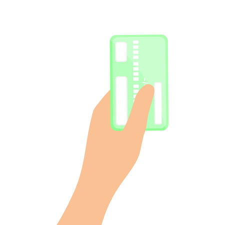 Vector illustration of a hand holding a credit card. Plastic credit card in hand. Vector flat illustration for website and banner designのイラスト素材