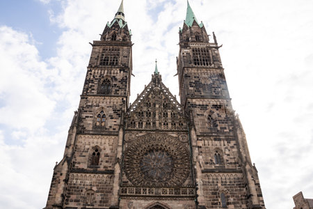 Gothic St. Lorenz Church in Nuremberg, Germany, beautifully restored after World War II, featuring stunning stained glass, grand organ, and medieval architecture.の写真素材