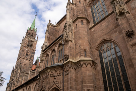 Gothic St. Lorenz Church in Nuremberg, Germany, beautifully restored after World War II, featuring stunning stained glass, grand organ, and medieval architecture.の写真素材