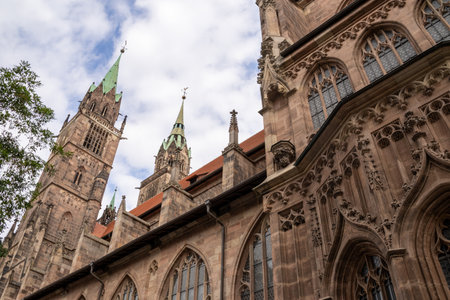 Gothic St. Lorenz Church in Nuremberg, Germany, beautifully restored after World War II, featuring stunning stained glass, grand organ, and medieval architecture.の写真素材
