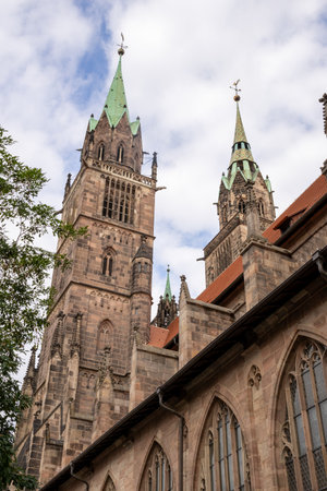 Gothic St. Lorenz Church in Nuremberg, Germany, beautifully restored after World War II, featuring stunning stained glass, grand organ, and medieval architecture.の写真素材