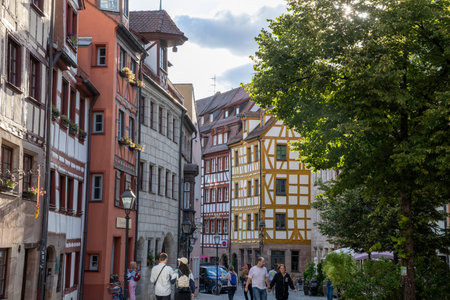 Colorful traditional timber-frame houses along WeiÃgerbergasse street in Nuremberg, Bavaria, Germany, showcasing charming medieval architecture in a picturesque old-town setting.の写真素材