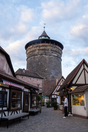 Handwerkerhof Nuremberg in Bavaria, Germany, featuring a cozy medieval village with traditional craft shops, timber-frame houses, and rustic restaurants.の写真素材
