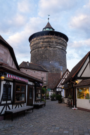 Handwerkerhof Nuremberg in Bavaria, Germany, featuring a cozy medieval village with traditional craft shops, timber-frame houses, and rustic restaurants.の写真素材