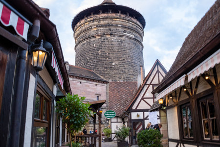 Handwerkerhof Nuremberg in Bavaria, Germany, featuring a cozy medieval village with traditional craft shops, timber-frame houses, and rustic restaurants.の写真素材