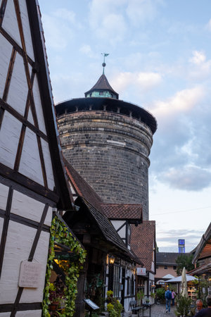 Handwerkerhof Nuremberg in Bavaria, Germany, featuring a cozy medieval village with traditional craft shops, timber-frame houses, and rustic restaurants.の写真素材