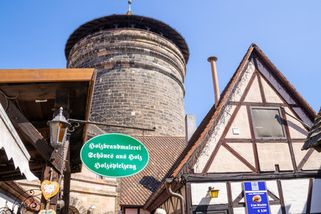 Handwerkerhof Nuremberg in Bavaria, Germany, featuring a cozy medieval village with traditional craft shops, timber-frame houses, and rustic restaurants.の写真素材