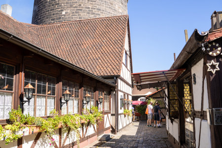 Handwerkerhof Nuremberg in Bavaria, Germany, featuring a cozy medieval village with traditional craft shops, timber-frame houses, and rustic restaurants.の写真素材
