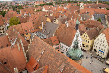 Colorful half-timbered houses in Rothenburg ob der Tauber, Bavaria, Germany. Medieval timber framed facades and quaint historic streets in a scenic European old town.の写真素材