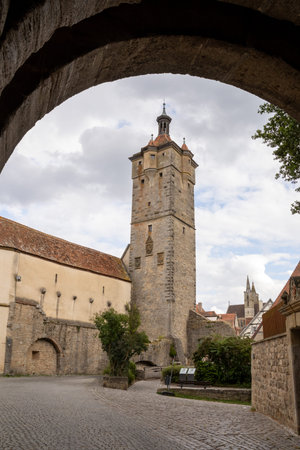 Klingentor gate and medieval city wall in Rothenburg ob der Tauber, Bavaria, Germany. Historic fortifications and well-preserved old town architecture, iconic European travel destiの写真素材