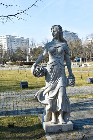 cement statue of a woman, Greek style, in the Alexandru Ioan Cuza park,in the capital of Romania, Bucharest. walk in the park. relaxing time.のeditorial素材