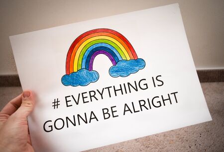 Everything is gonna be alright in hand drawing letters and a rainbow with clouds drawn by a child. quarantine corona virus flu, the covid 19.の写真素材