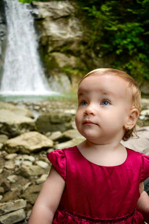 Portrait of a cute little caucasian baby girl with excited facial expressionのeditorial素材