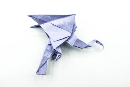 Gray origami eagle isolated on white background.Beautiful paper craft.の写真素材