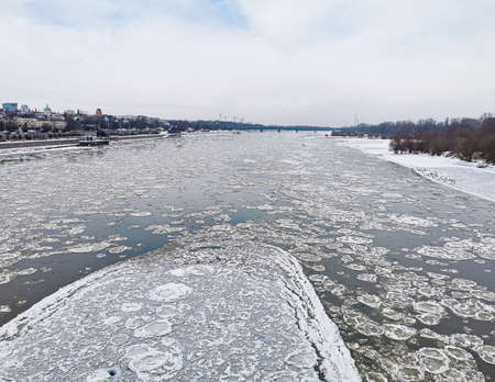 Frozen river. Ice on the river in winter. A lot of ice on the surface of the riverの写真素材