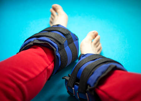 Sandbags with adjustable weight for exercising the muscles of the legs. Super and the best training for wrist and ankleの写真素材