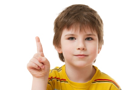 Boy with index finger up の写真素材