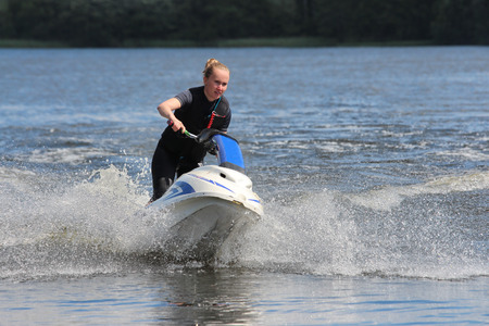 Action Photo girl on jet ski.